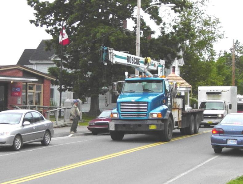 Travelling eastward on Main Street past the Post Office, 9:45am